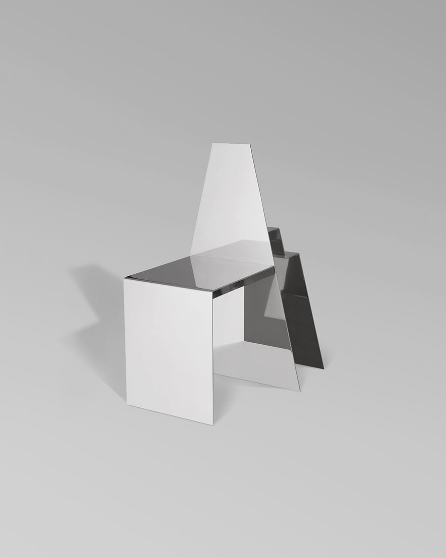 a white umbrella sitting on top of a white box 