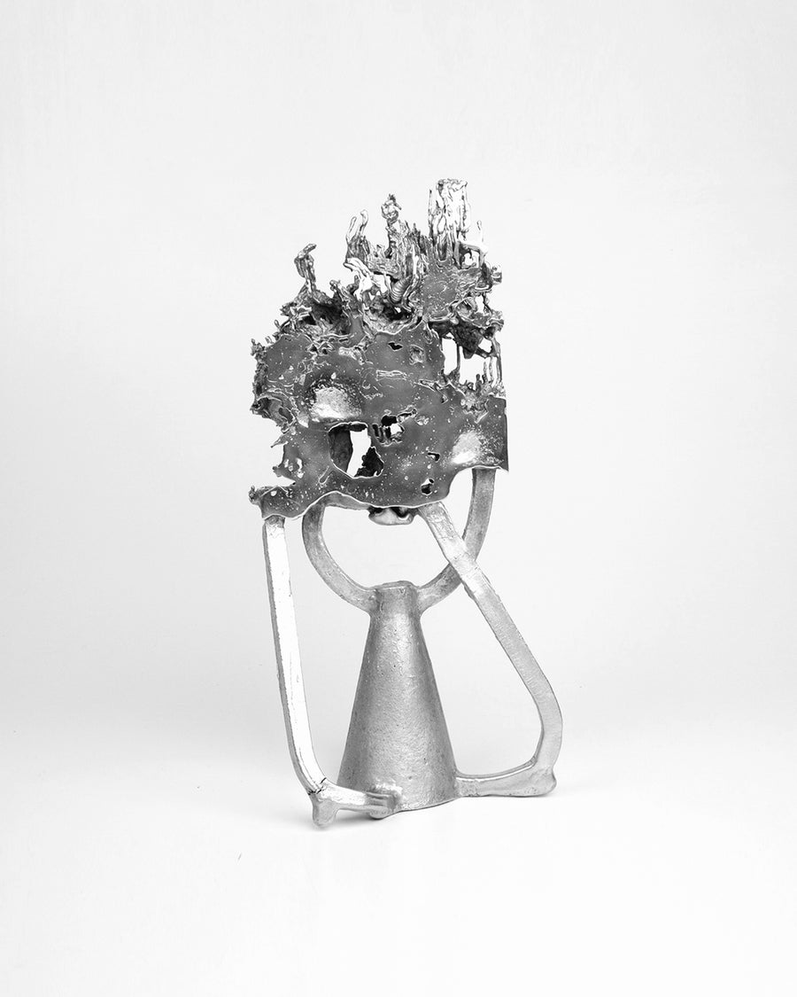 a black and white photo of a vase of flowers 