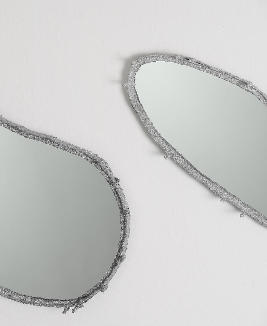 a pair of glasses on a white surface 